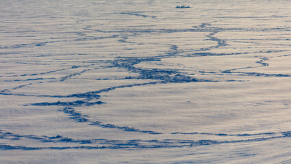 A large body of water with a dark blue color