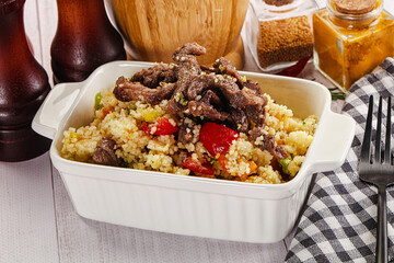 Traditional couscous with beef and vegetables