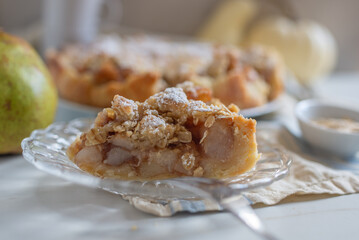 pear crumble cake in a baking form 