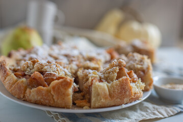 pear crumble cake in a baking form 