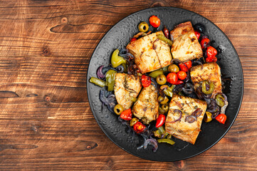 Baked or fried mackerel fish.