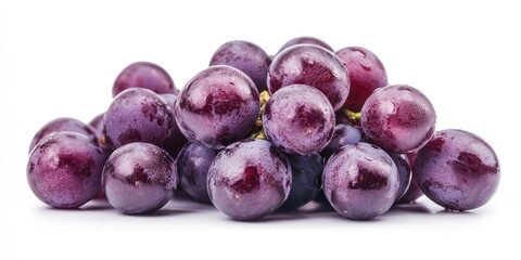 A group of freshly harvested purple grapes set against a white background. These vibrant purple grapes stand out nicely due to their isolation on the white surface.