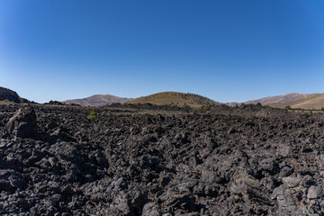 Aa lava flow. Big Craters Slab Lava Flow. North Crater Flow Trail / Craters of the Moon National Monument & Preserve. Volcanic Field. Idaho's eastern Snake River Plain.

