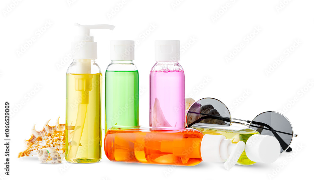 Poster assorted skincare products displayed on a white surface with a seashell