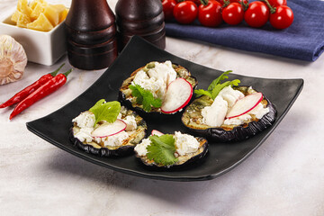 Grilled eggplant with cheese and radish