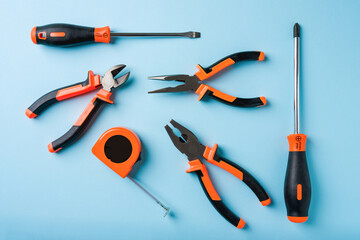 Handled tools or construction tools on blue background