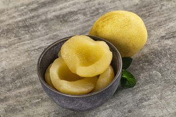 Canned yellow pear with syrup