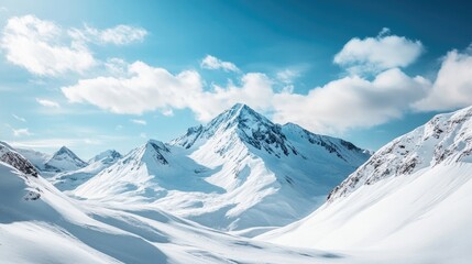 Obraz premium High snow-covered mountains create a stark and icy landscape that captures the essence of extreme cold. This mountainscape invites contemplation in its serene beauty and offers ample copy space.