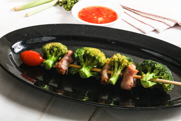 Thai Street foof satay with bacon and broccoli