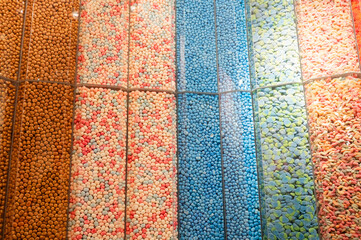 Colorful Candy Dispensers in a Sweet Shop