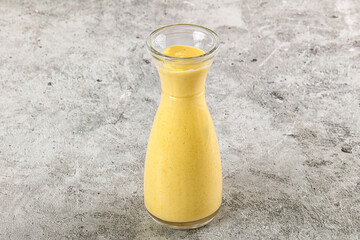 Cold sweet mango smoothie glass