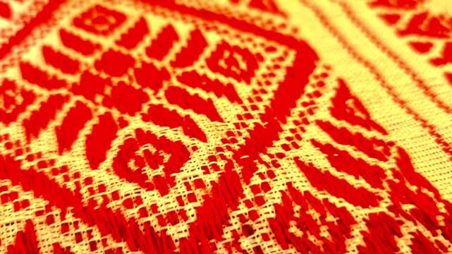 gamosa or gamusa from Assam. gamosa textile pattern. gamosa or gamusa is an article of significance for the indigenous people of Assam, India. It is generally a white rectangular piece of cloth . 