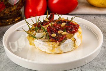 Baked camembert cheese with honey