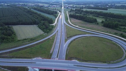 Nighttime aerial of busy freeway intersection