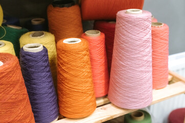 Colorful yarn cones for creative textile and craft projects