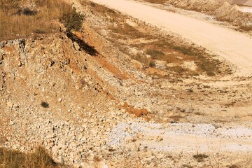 Serene quarry under warm midday sun