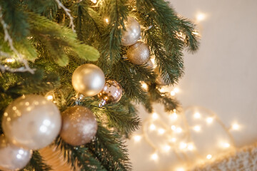 Christmas balls in close-up on the Christmas tree. Decorations for Christmas trees. The concept of celebrating New Year and Christmas