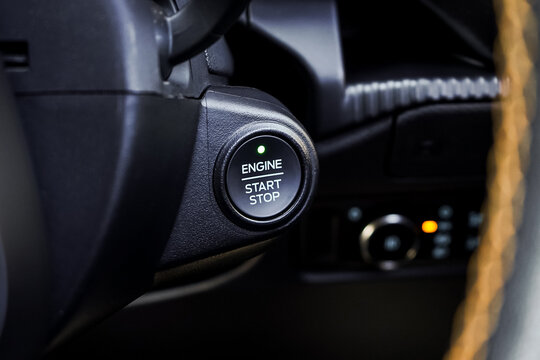 Close up engine car start button. Start stop engine modern new car button,Makes it easy to turn your auto mobile on and off. a key fob unique ,selective focus