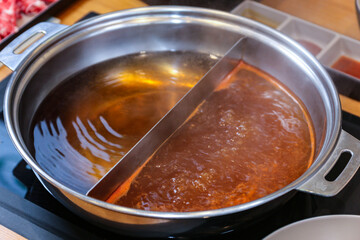 Korean style Shabu Shabu. Two types of broth. Mild and spicy taste