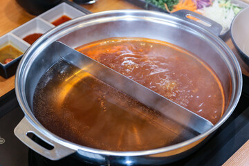 Korean style Shabu Shabu. Two types of broth. Mild and spicy taste