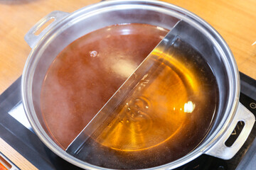 Korean style Shabu Shabu. Two types of broth. Mild and spicy taste