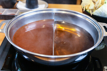 Korean style Shabu Shabu. Two types of broth. Mild and spicy taste