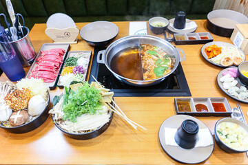 Korean style Shabu Shabu. Two types of broth. Mild and spicy taste