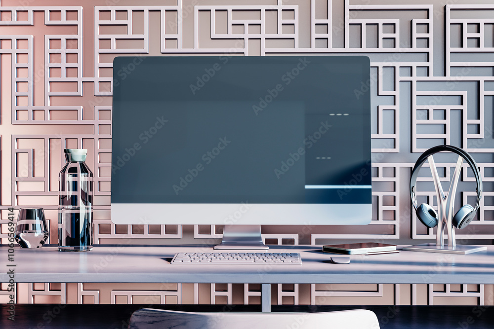 Poster Clean designer workplace with decorative ornamental wall, various small objects and big computer monitor with mock up place. 3D Rendering.