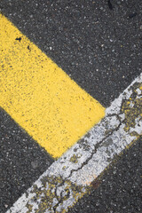 yellow land white ine on asphalt