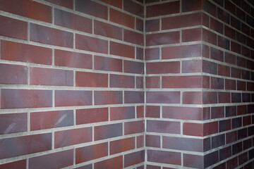 Beautiful new stone brick wall, red bricks very clean and even with space for texture background
