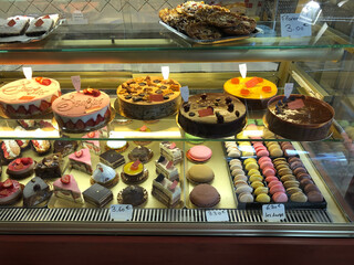 Assorted Delights: Colorful Desserts Displayed in a Pâtisserie