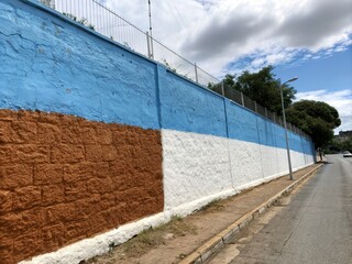 Obraz premium Abstract blue and white wall, accented with rich browns.