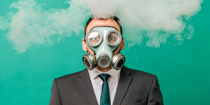 A man in a suit wearing a gas mask stands against a green background, with smoke billowing from the mask, creating a striking and surreal visual effect.