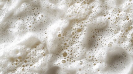Close up of white foam with small bubbles.