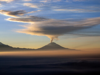 Popocatepetl Volcano erupting at sunrise aerial view