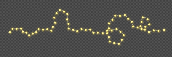 Festive Christmas light  glowing garland string on dark background.