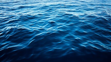 Pure blue Ocean water waves, middle of the ocean, top view