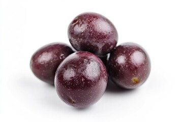 A stack of plums forming a tower, suitable for still life photography or as an illustration in food-related content