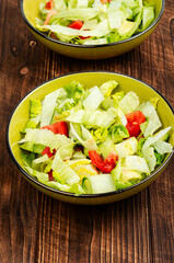 Healthy green salad with fresh vegetables.