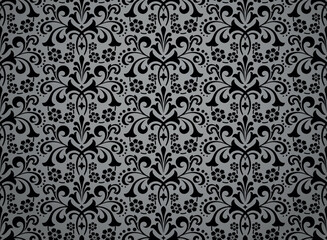 Floral pattern. Vintage wallpaper in the Baroque style. Seamless vector background. Gray and black ornament for fabric, wallpaper, packaging. Ornate Damask flower ornament