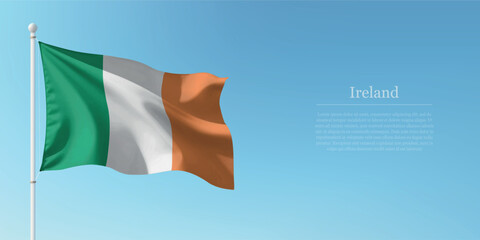 Waving Flag of Ireland Against Clear Blue Sky Copyspace