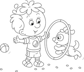 Happy little boy with a toy hoop playing and training his cheerful small puppy, black and white outline vector cartoon illustration for a coloring book page