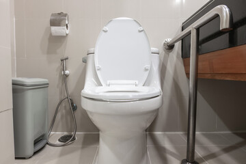 Toilet and handrail for elderly people at the bathroom in hospital, safty and medical concept