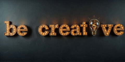 Be Creative Typography with Illuminated Letters and Light Bulb