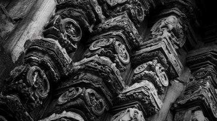 A close-up of the decorative carvings on the exterior of the Chennakesava Temple in Belur, showcasing the intricate details that reflect ancient craftsmanship