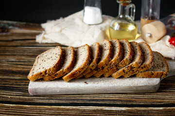 
Freshly baked bread with grains. on a wooden background. baking