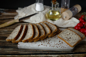 
Freshly baked bread with grains. on a wooden background. baking