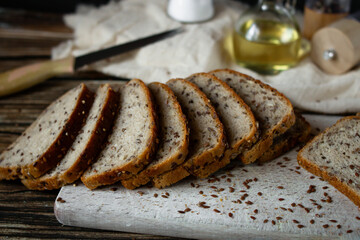 
Freshly baked bread with grains. on a wooden background. baking