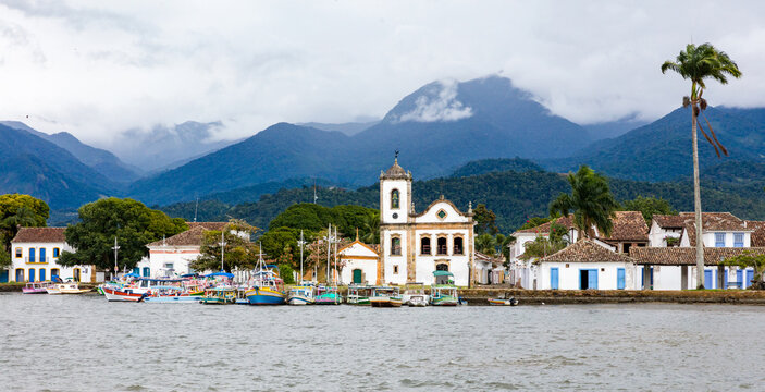 Panoramic view of Paraty Bay, historic center of Paraty and tourist boats at the pier in Rio de Janeiro, Brazil. World Heritage Site on the Brazilian Coast