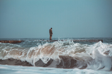 Soldier on Pier in Stormy, Foggy Weather